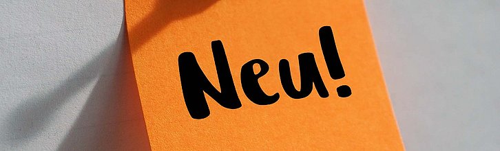 Post it mit der Aufschrift "Neu"